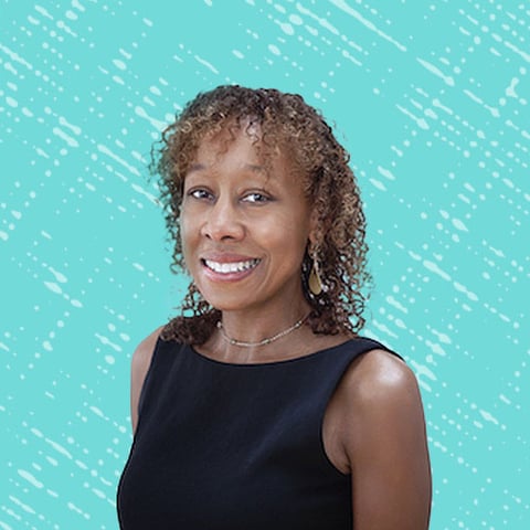 CJ Callen, CZI’s community leadership and capacity building director, smiles in a headshot.