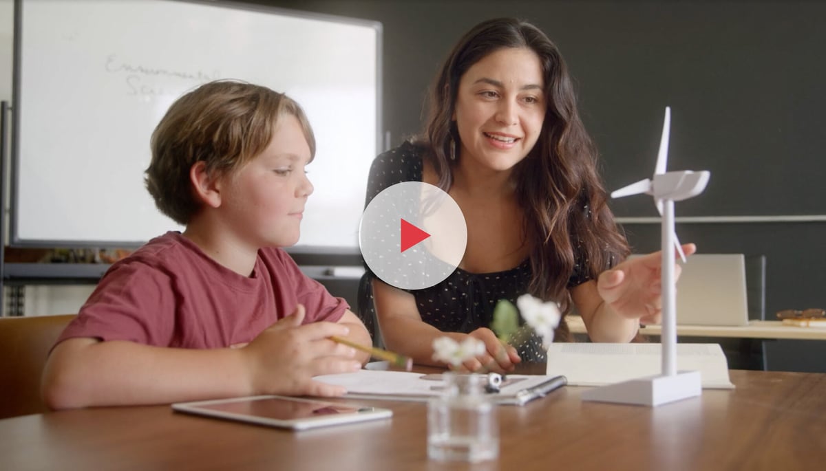 Screenshot of video showing a teacher and student