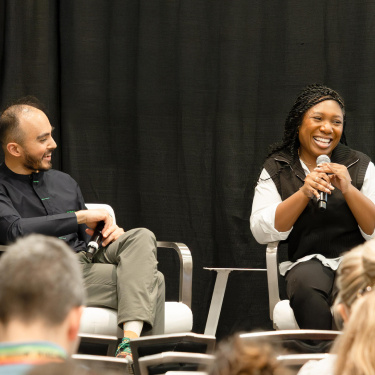 Yusuf Ahmad and Aneka Bruce speak in front of an audience during a SXSW EDU 2025 panel.